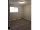 Bedroom with new flooring and modern lighting at 1931 Brentwood Dr, Anderson, IN 46011