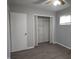 Bedroom featuring closet space, natural light from the window, and hardwood flooring at 1931 Brentwood Dr, Anderson, IN 46011
