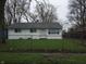 Cozy single story home featuring a fenced in front yard, offering both security and curb appeal at 1931 Brentwood Dr, Anderson, IN 46011