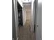 Hallway featuring hardwood flooring and access to the furnace system at 1931 Brentwood Dr, Anderson, IN 46011