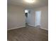 Spacious living room with vinyl flooring and fresh paint at 1931 Brentwood Dr, Anderson, IN 46011
