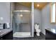 Modern bathroom featuring a glass-enclosed shower, sleek fixtures, and stylish tile work for a spa-like experience at 2001 Winchester Dr, Indianapolis, IN 46227