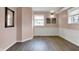 Versatile bonus room with neutral walls, chair rail detail and luxury vinyl plank flooring at 2001 Winchester Dr, Indianapolis, IN 46227