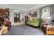 Welcoming living area with an open layout, comfortable furnishings, and easy access to the dining room and kitchen at 2001 Winchester Dr, Indianapolis, IN 46227