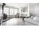 Spacious living room featuring a wood burning stove, hardwood floors, and comfortable seating at 2034 Milburn Dr, Brownsburg, IN 46112