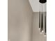 Contemporary lighting fixture featuring sleek, minimalist design with elongated pendant lights at 2103 Postmaster Ln, Greenfield, IN 46140