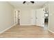 Spacious bedroom with three doors including one to the kitchen at 2206 Tansel Crossing Cir, Indianapolis, IN 46234