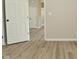 Inviting hallway with neutral paint and modern wood-look flooring at 2206 Tansel Crossing Cir, Indianapolis, IN 46234