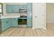 The kitchen is equipped with stainless steel appliances and ample cabinetry at 2206 Tansel Crossing Cir, Indianapolis, IN 46234