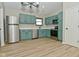 Stylish kitchen boasts stainless steel appliances and plenty of cabinet space at 2206 Tansel Crossing Cir, Indianapolis, IN 46234