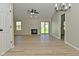 Spacious living room with wood flooring, fireplace, and ample natural light at 2206 Tansel Crossing Cir, Indianapolis, IN 46234