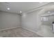 Spacious basement features modern colors and neutral carpeting at 2249 N Centennial St, Indianapolis, IN 46222