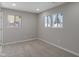 Neutral bedroom featuring plush carpeting, modern windows, and recessed lighting at 2249 N Centennial St, Indianapolis, IN 46222