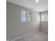 Bedroom with neutral walls and carpet with two windows providing natural light at 2249 N Centennial St, Indianapolis, IN 46222