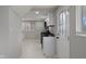 Kitchen featuring white cabinets, dark countertops and stainless steel appliances at 2249 N Centennial St, Indianapolis, IN 46222