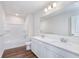 Bright bathroom with a double sink vanity and tub shower combo at 2741 Penn Ave, Plainfield, IN 46168