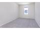 Cozy bedroom with a window and carpeted floors offers a tranquil retreat at 2741 Penn Ave, Plainfield, IN 46168