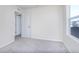Neutral bedroom with gray carpet, white trim, and ample natural light at 2741 Penn Ave, Plainfield, IN 46168