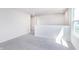 Cozy loft space with natural light, carpet flooring and an open layout at 2741 Penn Ave, Plainfield, IN 46168
