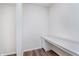 Home office nook with built-in desk, quartz countertop, and laminate flooring at 2741 Penn Ave, Plainfield, IN 46168