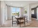 Elegant dining room with a large window, modern decor and a spacious table at 2759 Evergreen Ave, Plainfield, IN 46168