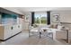 Bright living room with a comfortable white sofa, stylish decor, and large windows at 2759 Evergreen Ave, Plainfield, IN 46168