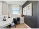 Modern home office with built-in desk, stylish decor, and ample natural light at 2759 Evergreen Ave, Plainfield, IN 46168