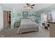 Bright bedroom with a large window, soft carpeting, and neutral paint at 3627 Miesha Dr, Indianapolis, IN 46217