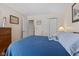Standard bedroom featuring soft carpet, closet, and a comfortable bed at 3627 Miesha Dr, Indianapolis, IN 46217