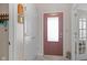 Inviting entryway featuring a modern front door, a coat closet, and neutral wall tones at 3627 Miesha Dr, Indianapolis, IN 46217