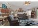 Open-concept living room with modern decor, comfortable seating, and hardwood floors at 3627 Miesha Dr, Indianapolis, IN 46217