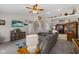 Comfortable living room with vaulted ceilings, ceiling fan, and open layout to the kitchen at 3627 Miesha Dr, Indianapolis, IN 46217