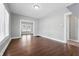 Spacious living room featuring hardwood floors and generous natural light at 402 W 38Th St, Indianapolis, IN 46208