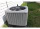 Side view of a modern, gray central air conditioning unit sitting on a concrete slab outside the home at 42 White Lick Dr, Indianapolis, IN 46227