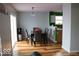 Cozy dining area with hardwood floors, neutral walls, and sliding glass door at 42 White Lick Dr, Indianapolis, IN 46227