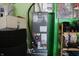 Home furnace for heating and cooling with green walls and shelving at 42 White Lick Dr, Indianapolis, IN 46227