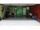 Spacious garage featuring painted walls, storage shelving, and ample room for vehicles at 42 White Lick Dr, Indianapolis, IN 46227