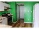 Functional kitchen with appliances, wood cabinets, and an open view to the dining area at 42 White Lick Dr, Indianapolis, IN 46227