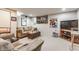 Spacious finished basement with carpet, large seating area, and entertainment setup with TV at 4451 N Washington Blvd, Indianapolis, IN 46205