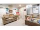 Finished basement with carpet, two couches, and closet, perfect for relaxation and entertainment at 4451 N Washington Blvd, Indianapolis, IN 46205