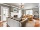 Comfortable living area with a fireplace and neutral decor, perfect for relaxation at 4451 N Washington Blvd, Indianapolis, IN 46205