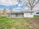 View of the shed with white siding and an open patio at 4897 Walker St, Greenwood, IN 46143