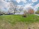 A cozy home with lush green lawn and a convenient, attached one-car garage at 4897 Walker St, Greenwood, IN 46143