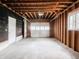 Empty garage with door open revealing the space and garage door mechanism at 4897 Walker St, Greenwood, IN 46143