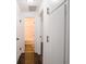 Bright hallway showcasing modern white trim and hardwood floors at 4897 Walker St, Greenwood, IN 46143