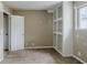 Bedroom featuring a large built-in cabinet and natural light from the window at 5017 E 14Th St, Indianapolis, IN 46201