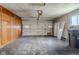 Spacious garage with built-in storage cabinets and an automatic door at 5017 E 14Th St, Indianapolis, IN 46201
