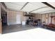 Spacious garage with overhead storage and plenty of room for vehicles at 5051 Arling Ct, Indianapolis, IN 46237