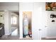Storage area featuring a water heater, white walls, and a light colored floor at 5051 Arling Ct, Indianapolis, IN 46237