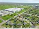 Neighborhood aerial view showing the nearby Speedway manufacturing facility and community at 5124 Mccray St, Indianapolis, IN 46224